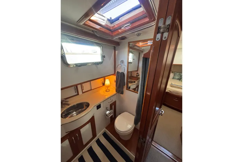 Slide: The Image of Luxurious bathroom interior of 2006 Grand Banks 47 Heritage EU yacht with skylight. - 35