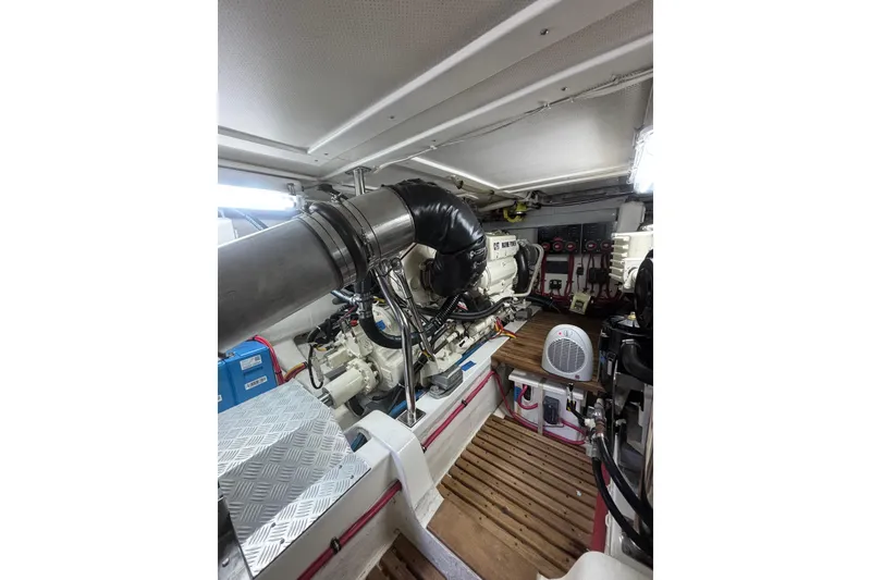 Slide: The Image of Engine room of 2006 Grand Banks 47 Heritage EU yacht, featuring mechanical components and equipment. - 37