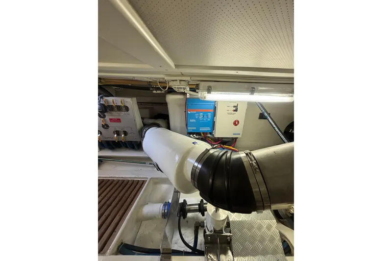 Slide: The Image of Engine room of 2006 Grand Banks 47 Heritage EU yacht, featuring mechanical components. - 38