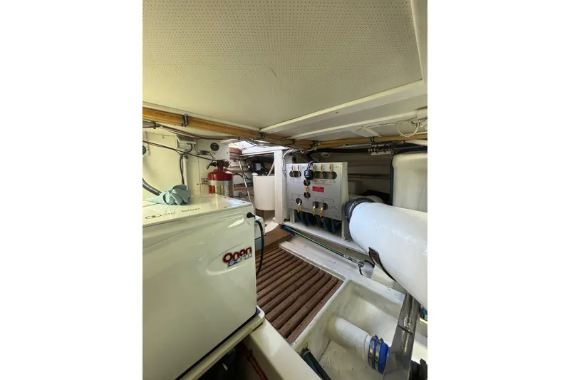 Slide: The Image of Engine room of 2006 Grand Banks 47 Heritage EU yacht with Onan generator and equipment. - 41