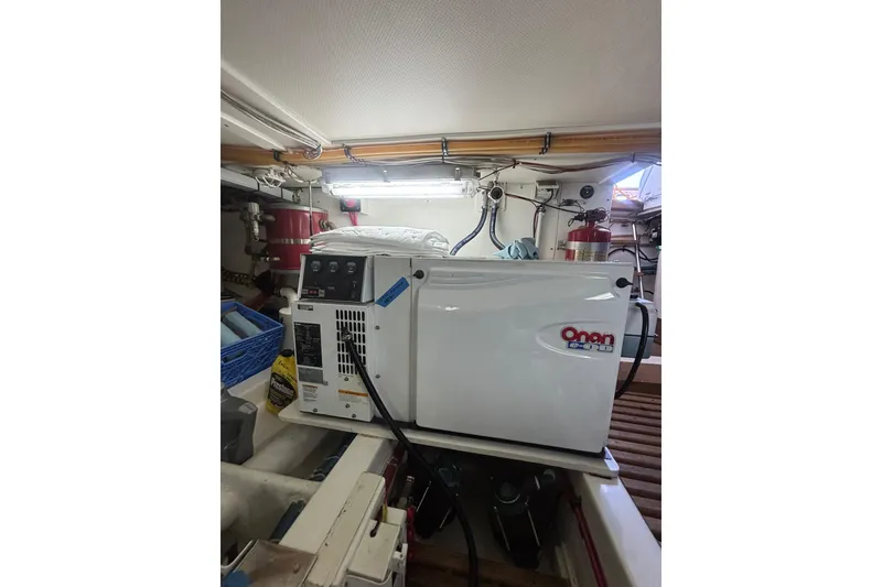 Slide: The Image of Engine room of 2006 Grand Banks 47 Heritage EU with Onan generator. - 42