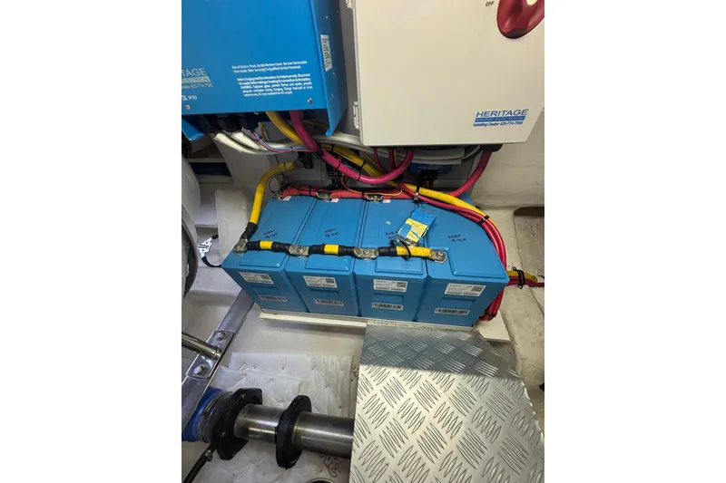 Slide: The Image of Engine room of 2006 Grand Banks 47 Heritage EU with batteries and wiring. - 46