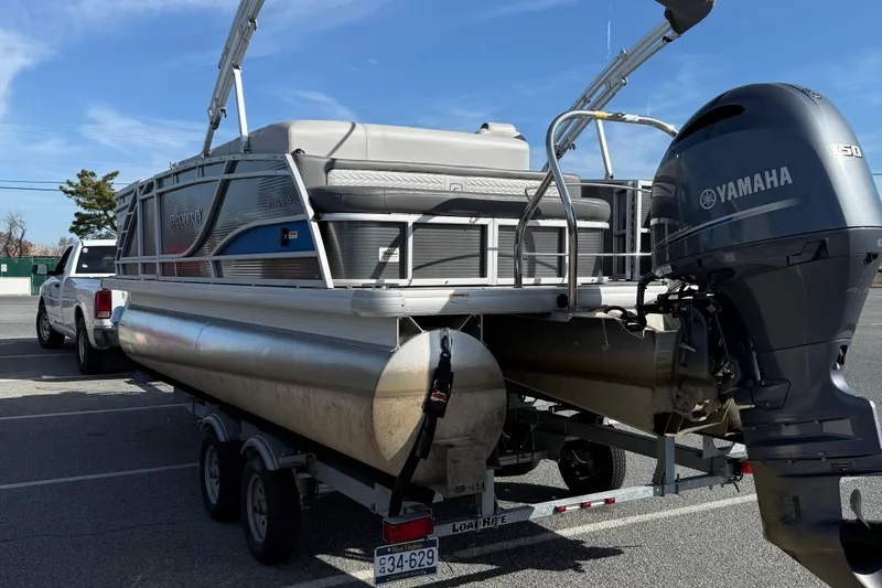Slide: The Image of 2021 Godfrey Monaco 215 C pontoon boat with Yamaha engine on trailer. - 6