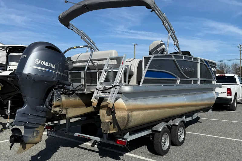 Slide: The Image of 2021 Godfrey Monaco 215 C pontoon boat with Yamaha outboard motor on trailer. - 8