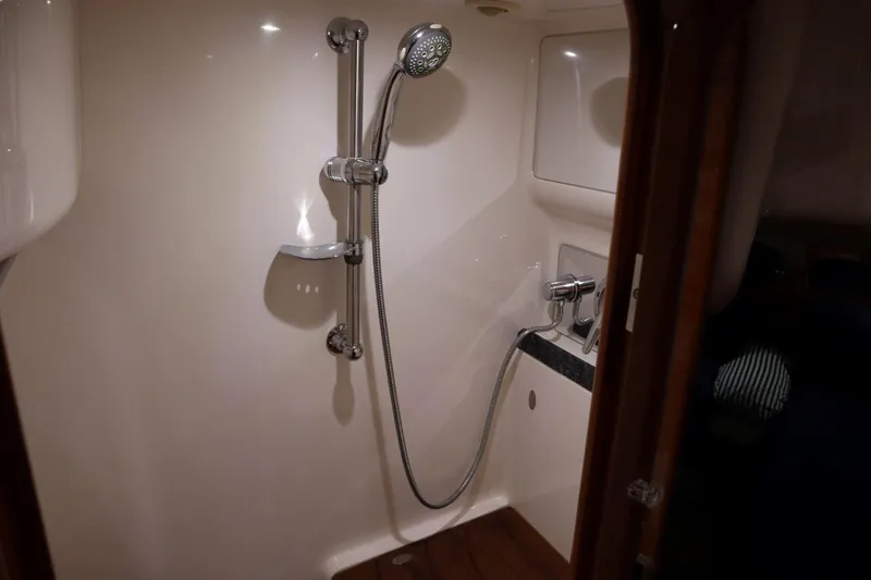 Slide: The Image of Luxurious bathroom shower in 2010 Regal 46 Sport Coupe yacht. - 24