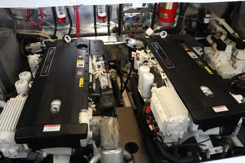 Slide: The Image of Engine room of a 2010 Regal 46 Sport Coupe with twin diesel engines. - 35