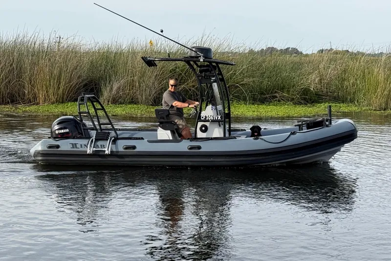 The Image of Inmar 660R-PT-PR 2023 boat on calm water with driver. - 0