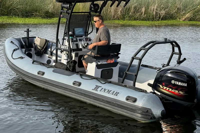 Slide: The Image of 2023 Inmar 660R-PT-PR boat with Yamaha engine on a calm river. - 10