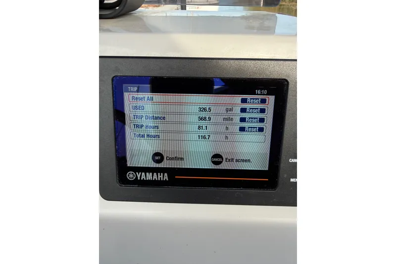 Slide: The Image of Yamaha display showing trip data: 326.5 gallons used, 568.9 miles, 81.1 trip hours. - 4