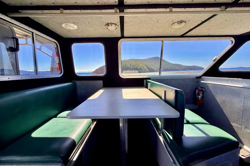 Slide: The Image of Interior of a 2001 Maxweld Maxcat boat with scenic window view. - 30