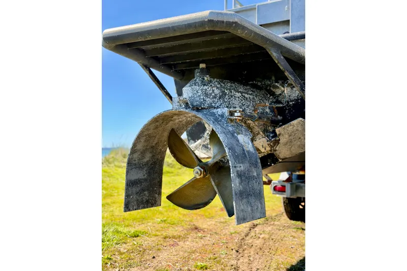 Slide: The Image of Propeller of a 2001 Maxweld Maxcat boat on a sunny day. - 4