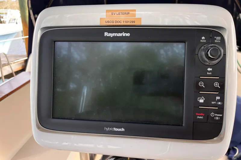Slide: The Image of Raymarine HybridTouch display on 2000 Island Packet 350 sailboat cockpit. - 18