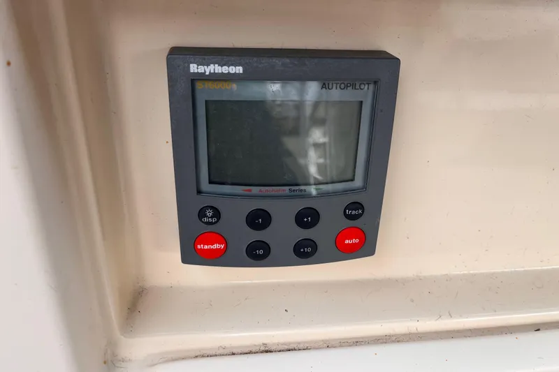 Slide: The Image of Raytheon ST6000+ autopilot control panel on 2000 Island Packet 350 sailboat. - 23