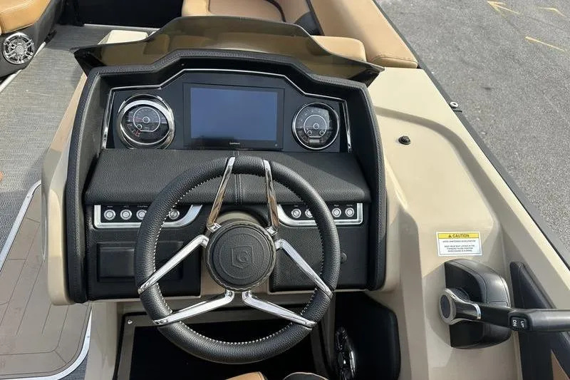Slide: The Image of Steering console of 2024 Godfrey AquaPatio 235 ULC iMPACT pontoon boat. - 19