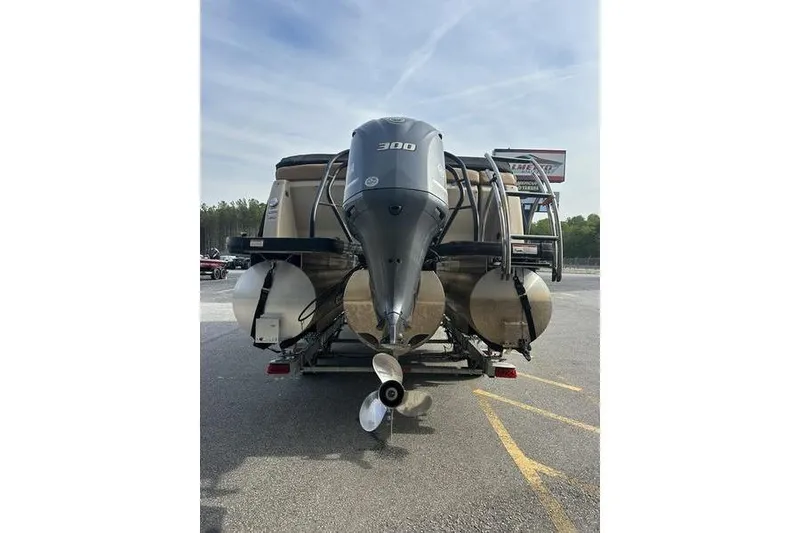 Slide: The Image of 2024 Godfrey AquaPatio 235 ULC iMPACT pontoon boat with powerful outboard motor. - 5