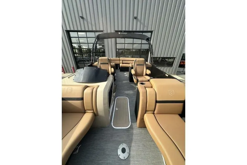 Slide: The Image of 2024 Godfrey AquaPatio 235 ULC iMPACT pontoon boat with luxurious seating and modern design. - 9
