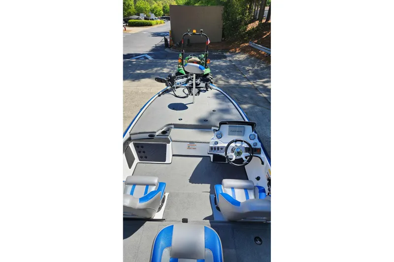 Slide: The Image of 2025 Nitro Z18 Pro boat interior with steering wheel and seating. - 7