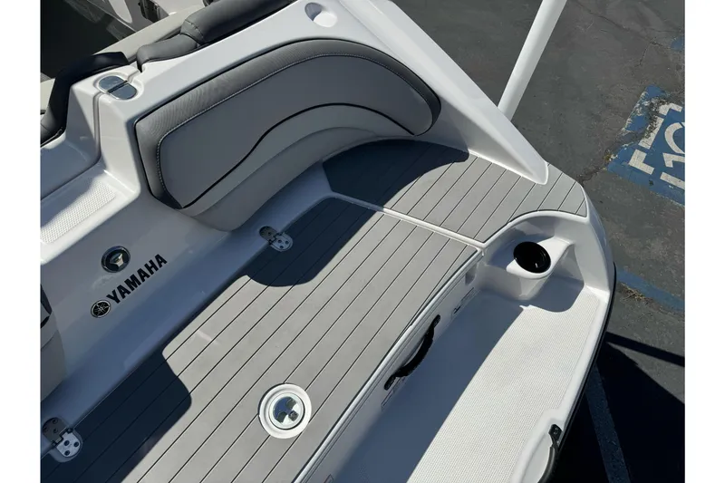 Slide: The Image of 2024 Yamaha AR190 boat interior with sleek seating and modern design. - 11