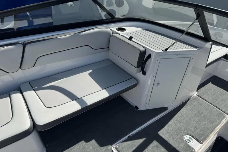 Slide: The Image of 2024 Yamaha Boats AR190 interior seating with sleek design and modern upholstery. - 18
