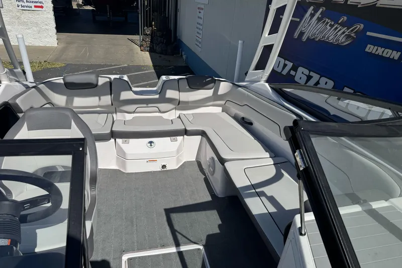 Slide: The Image of 2024 Yamaha Boats AR190 interior with spacious seating and modern design. - 28
