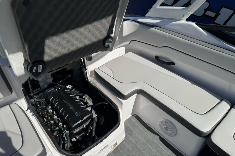 Slide: The Image of 2024 Yamaha AR190 boat engine compartment with seating area. - 30