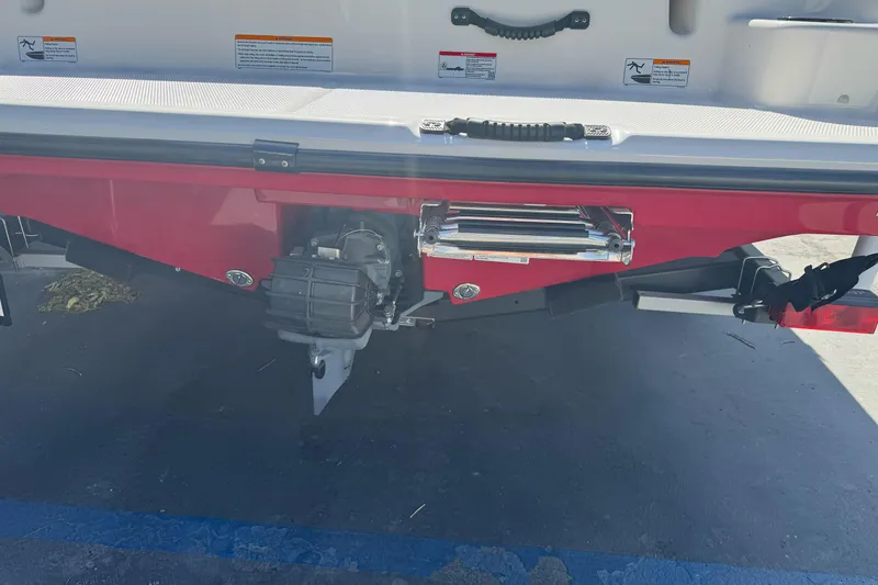 Slide: The Image of 2024 Yamaha Boats AR190 rear view with ladder and engine details. - 33