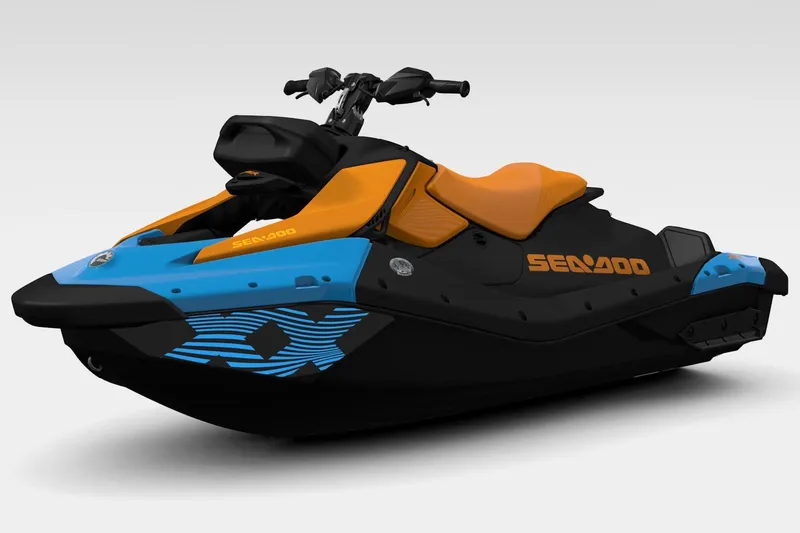 Slide: The Image of 2026 Sea-Doo Spark Trixx for 1, vibrant orange and blue design, side view. - 5