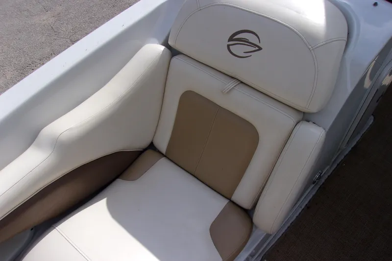 Slide: The Image of 2013 Crownline Eclipse E6 boat seat with beige and white upholstery. - 10