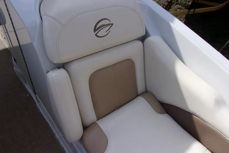 Slide: The Image of 2013 Crownline Eclipse E6 boat seat with beige and white upholstery. - 11