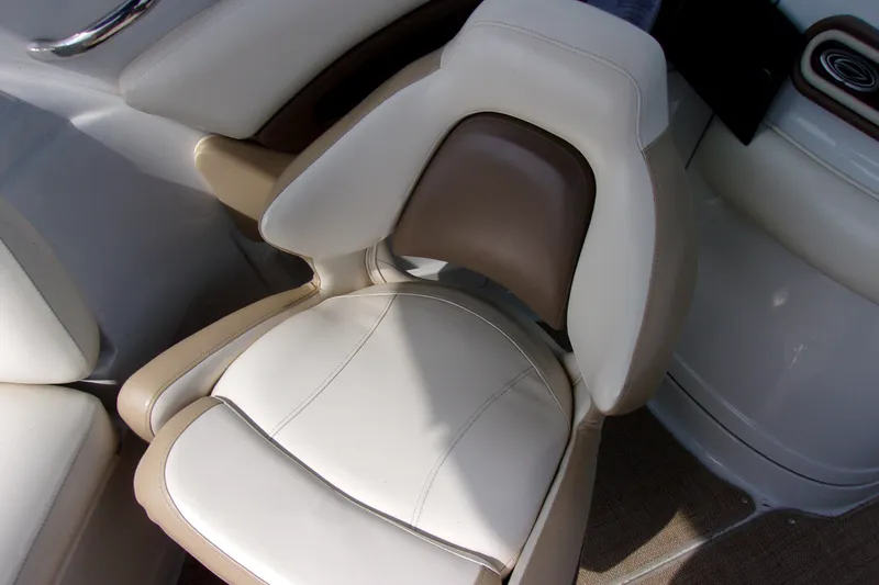 Slide: The Image of 2013 Crownline Eclipse E6 boat seat with beige and white upholstery. - 13