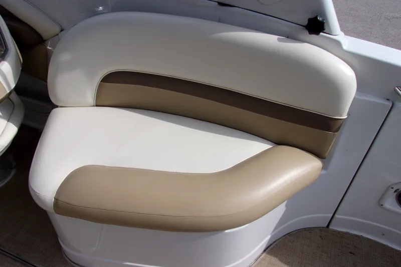 Slide: The Image of 2013 Crownline Eclipse E6 boat seat with beige and white upholstery. - 15