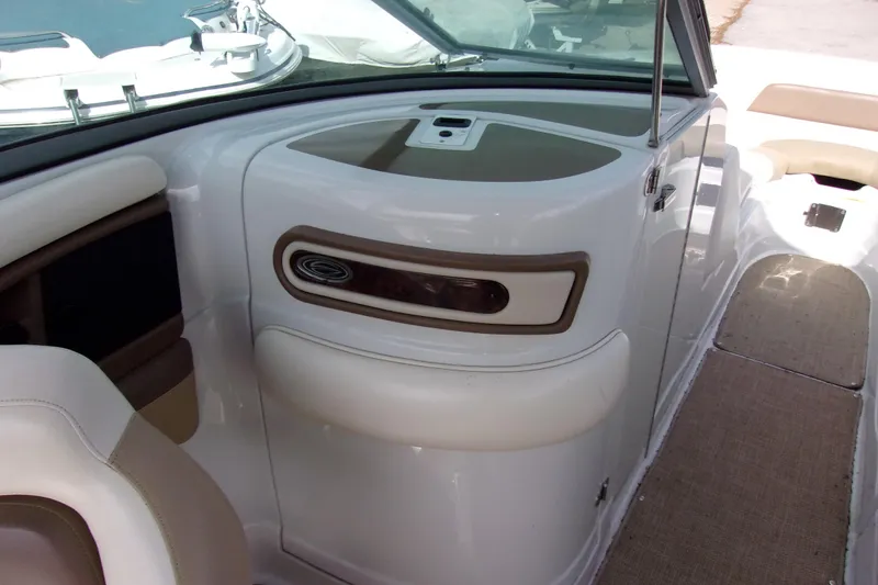 Slide: The Image of Interior view of a 2013 Crownline Eclipse E6 boat, featuring sleek design and seating. - 7