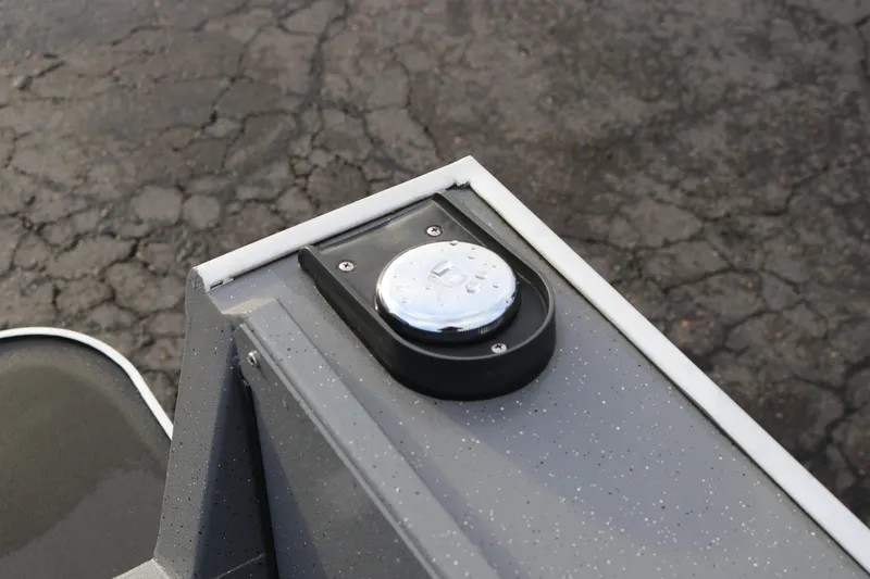 Slide: The Image of Fuel cap on 2026 Alumaweld Adventurer 18 boat, featuring sleek gray design. - 18