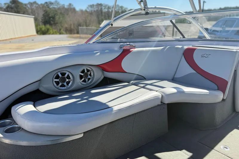 Slide: The Image of Interior of 2004 Nautique Air Nautique 226 boat with stylish seating and speakers. - 12