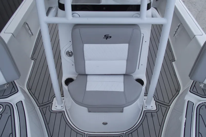 Slide: The Image of 2019 Sea Pro 208 Bay boat interior with gray and white seating. - 14