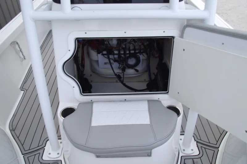 Slide: The Image of 2019 Sea Pro 208 Bay boat interior storage compartment with open hatch and seating. - 15