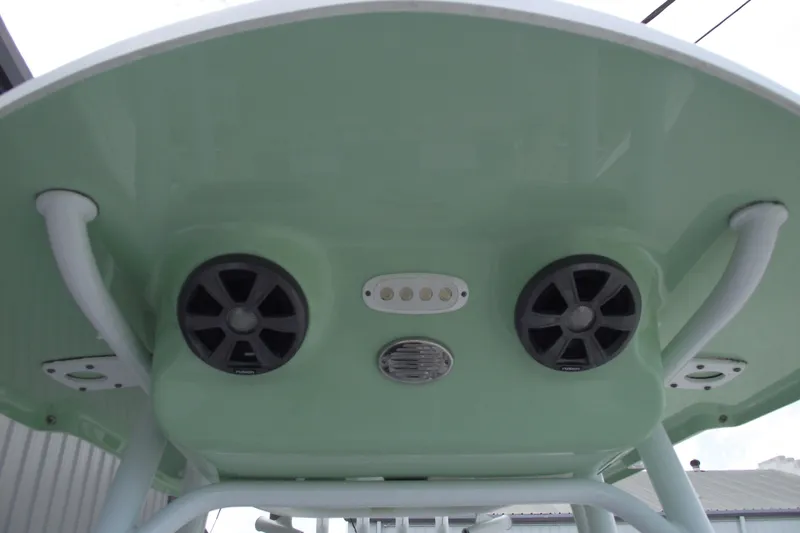 Slide: The Image of 2019 Sea Pro 208 Bay boat with speakers and lights on the underside of the canopy. - 17