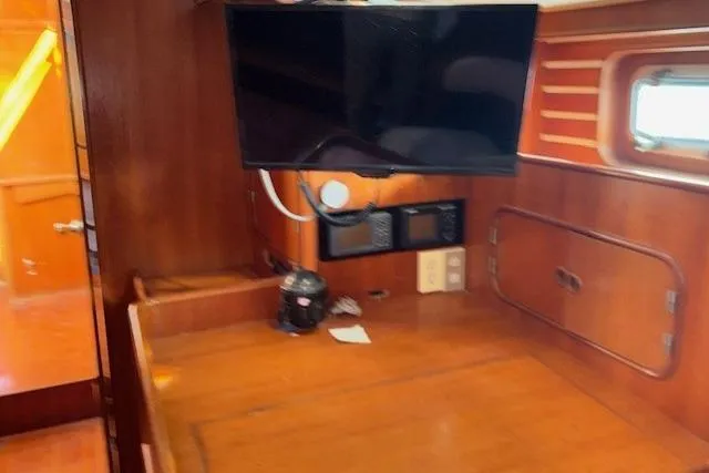 Slide: The Image of Control panel of a 1983 Tayana 55 yacht with navigation instruments. - 15