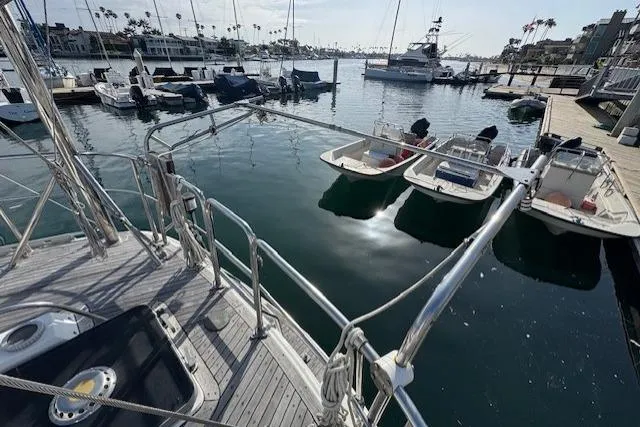 Slide: The Image of Anchor winch on 1983 Tayana 55 sailboat deck, docked at marina. - 7