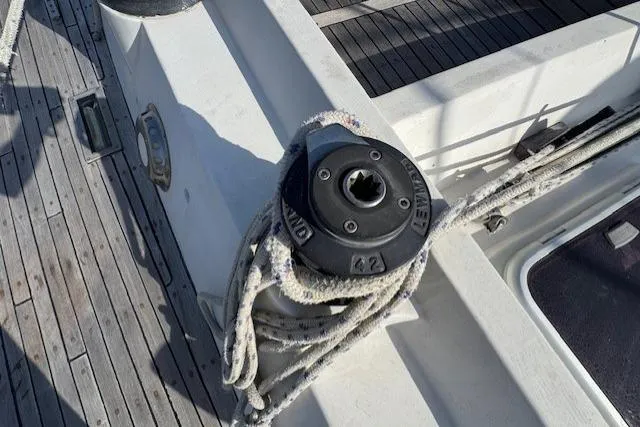 Slide: The Image of Deck view of 1983 Tayana 55 sailboat with winches and rope. - 9