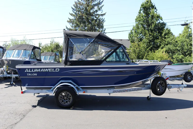 The Image of 2026 Alumaweld Talon 18 boat on trailer, parked outdoors. - 0