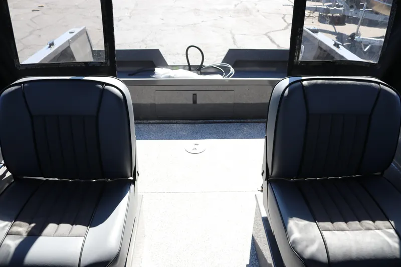 Slide: The Image of Interior of 2026 Alumaweld Talon 18 boat with two black seats. - 11