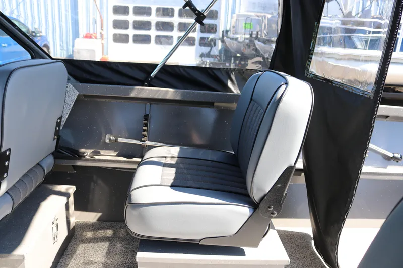 Slide: The Image of Interior of 2026 Alumaweld Talon 18 boat with gray seating and black accents. - 15