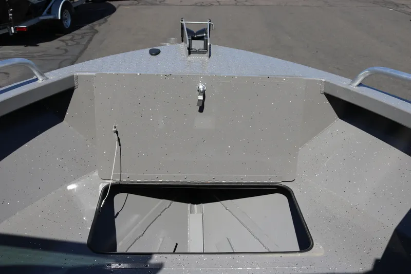 Slide: The Image of 2026 Alumaweld Talon 18 boat interior with open storage compartment. - 8