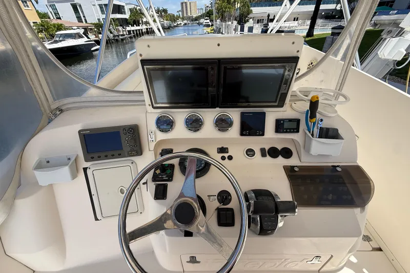 Slide: The Image of Helm of 2001 Intrepid 377 Walkaround with navigation instruments and steering wheel. - 10