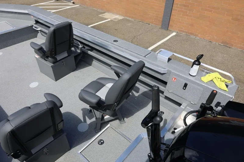 Slide: The Image of Interior of 2026 Thunder Jet 209 Rush OT boat with seating and controls. - 17