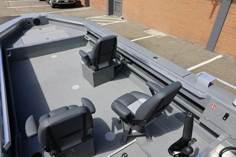 Slide: The Image of 2026 Thunder Jet 209 Rush OT boat interior with seating and spacious deck. - 18