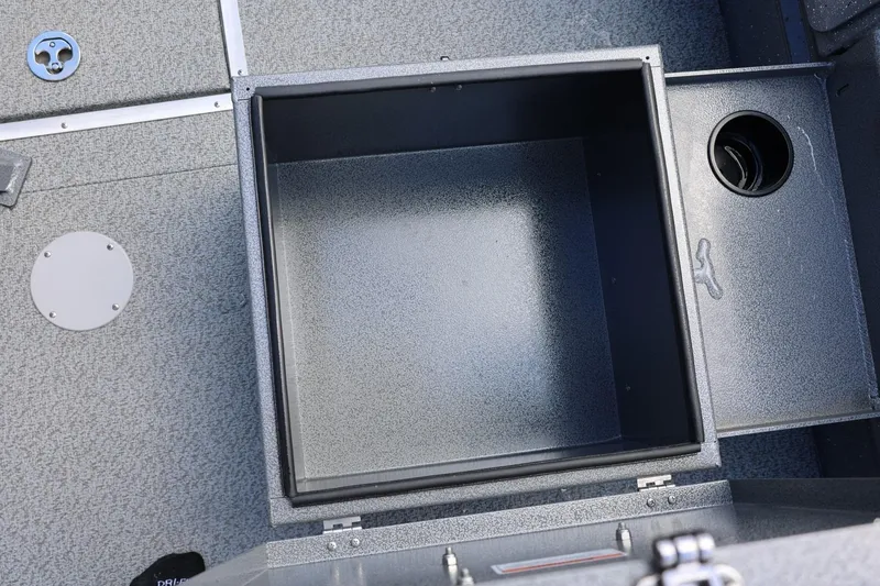 Slide: The Image of Storage compartment of 2026 Thunder Jet 209 Rush OT boat, featuring durable metal construction. - 29