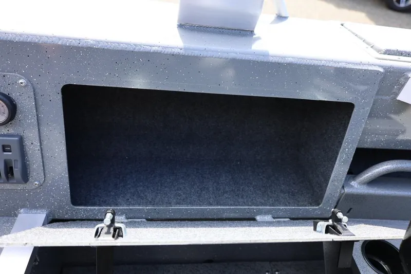 Slide: The Image of Storage compartment of 2026 Thunder Jet 209 Rush OT boat, featuring a speckled finish. - 38