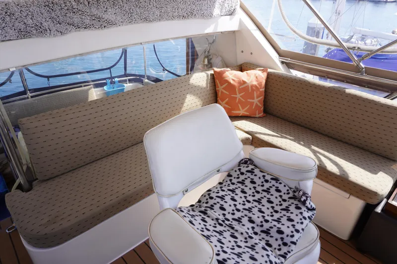 Slide: The Image of Interior of a 1996 Symbol 41 Aft Cabin Yacht with cozy seating. - 10